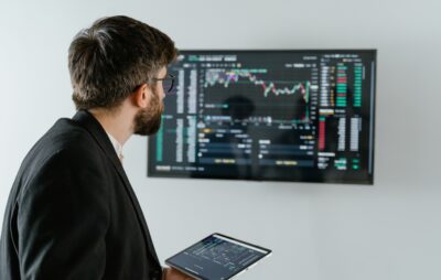 Person Looking at Financial Dashboard for SOC1 Reporting